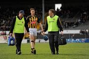 28 March 2010; Kilkenny's Brian Hogan is assisted by physio Robbie Lodge, left, and Dr Tadhg Crowley. Allianz GAA Hurling National League, Division 1, Round 5, Kilkenny v Galway, Nowlan Park, Kilkenny. Picture credit: Ray McManus / SPORTSFILE