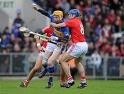 4 April 2010; Lar Corbett, Tipperary, in action against Tom Kenny and Aiske O Hailpin, Cork. Allianz GAA Hurling National League Division 1 Round 6, Cork v Tipperary, Pairc Ui Chaoimh, Cork. Picture credit: Matt Browne / SPORTSFILE
