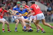4 April 2010; Noel McGrath, Tipperary, in action against Tadgh Og Murphy,10, Pat Horgan and Aiske O Hailpin,14, Cork. Allianz GAA Hurling National League Division 1 Round 6, Cork v Tipperary, Pairc Ui Chaoimh, Cork. Picture credit: Matt Browne / SPORTSFILE