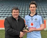 4 April 2010; Nicky Devereux, Dublin, is presented with the award for Cadbury Hero of the Match, by Cadbury representative Ken Hanamy. Cadbury Leinster GAA Football Under 21 Championship Final, Dublin v Westmeath, Parnell Park, Dublin. Picture credit: Stephen McCarthy / SPORTSFILE