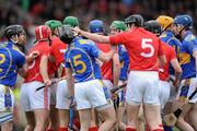 4 April 2010; Paul Kelly, 15, Tipperary, and John Gardiner, Cork square up during the game. Allianz GAA Hurling National League Division 1 Round 6, Cork v Tipperary, Pairc Ui Chaoimh, Cork. Picture credit: Matt Browne / SPORTSFILE