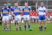 4 April 2010; Cork and Tipperary players stand for the National Anthem. Allianz GAA Hurling National League Division 1 Round 6, Cork v Tipperary, Pairc Ui Chaoimh, Cork. Picture credit: Matt Browne / SPORTSFILE