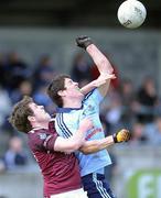 4 April 2010; Rory O'Carroll, Dublin, punches the ball away despite the challenge of Conor Lynam, Westmeath. Cadbury Leinster GAA Football Under 21 Championship Final, Dublin v Westmeath, Parnell Park, Dublin. Picture credit: Daire Brennan / SPORTSFILE
