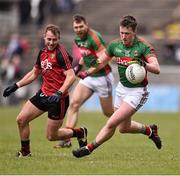 3 April 2016; Cillian O'Connor, Mayo, in action against Gerard McGovern, Down. Allianz Football League Division 1 Round 7, Mayo v Down. Elverys MacHale Park, Castlebar, Co. Mayo. Picture credit: David Maher / SPORTSFILE