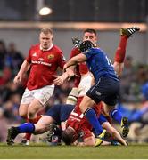 2 April 2016; Dave Kilcoyne, Munster, is tackled by Cian Healy, Leinster, which Cian Healy was shown a yellow card for. Guinness PRO12 Round 19, Leinster v Munster. Aviva Stadium, Lansdowne Road, Dublin. Picture credit: Ramsey Cardy / SPORTSFILE