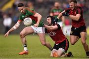 3 April 2016; Evan Regan, Mayo, in action against Kevin McKernan, left, and Darren O'Hagan, Down. Allianz Football League Division 1 Round 7, Mayo v Down. Elverys MacHale Park, Castlebar, Co. Mayo. Picture credit: David Maher / SPORTSFILE