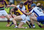 3 April 2016; Aidan Nolan, Wexford, is tackled by Jamie Barron, Waterford. Allianz Hurling League Division 1 Quarter-Final, Wexford v Waterford.Innovate Wexford Park, Wexford. Picture credit: Ramsey Cardy / SPORTSFILE