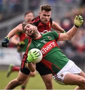 3 April 2016; Aidan O'Shea, Mayo, in action against Gerard Collins, Down. Allianz Football League Division 1 Round 7, Mayo v Down. Elverys MacHale Park, Castlebar, Co. Mayo. Picture credit: David Maher / SPORTSFILE