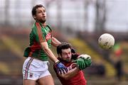 3 April 2016; Tom Parsons, Mayo, in action against Kevin McKernan, Down. Allianz Football League Division 1 Round 7, Mayo v Down. Elverys MacHale Park, Castlebar, Co. Mayo. Picture credit: David Maher / SPORTSFILE
