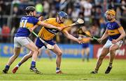 3 April 2016; Bobby Duggan, Clare, in action against Dan McCormack, left, and Ronan Maher, Tipperary. Allianz Hurling League Division 1 Quarter-Final, Clare v Tipperary. Cusack Park, Ennis, Co. Clare. Picture credit: Diarmuid Greene / SPORTSFILE