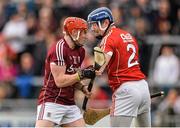 3 April 2016; Conor Whelan, Galway, and Damien Cahalane, Cork, tussle during the match.  Allianz Hurling League, Division 1, Relegation Play-off, Galway v Cork. Pearse Stadium, Galway. Picture credit: Ray Ryan / SPORTSFILE