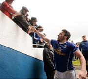 3 April 2016; Conor Moynagh, Cavan, celebrates with supporters after the match. Allianz Football League, Division 2, Round 7, Cavan v Galway. Kingspan Breffni Park, Cavan. Picture credit: Cody Glenn / SPORTSFILE