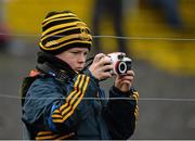 3 April 2016; Eight year old Kevin Gray tries to take photographs of his uncle Rory Kavanagh, Donegal, during the game. Allianz Football League Division 1, Round 7, Monaghan v Donegal. St Mary's Park, Castleblayney, Co. Monaghan. Picture credit: Dáire Brennan / SPORTSFILE
