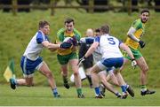 3 April 2016; Leo McLoone, Donegal, in action against Monaghan players, left to right, Darren Hughes, Fintan Kelly, and Dessie Mone. Allianz Football League Division 1, Round 7, Monaghan v Donegal. St Mary's Park, Castleblayney, Co. Monaghan. Picture credit: Dáire Brennan / SPORTSFILE