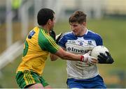 3 April 2016; Darren Hughes, Monaghan, in action against Frank McGlynn, Donegal. Allianz Football League Division 1, Round 7, Monaghan v Donegal. St Mary's Park, Castleblayney, Co. Monaghan. Picture credit: Dáire Brennan / SPORTSFILE