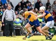 3 April 2016; Clare manager Davy Fitzgerald looks on as Clare's Colin Ryan is tackled by Tipperary's Brendan Maher. Allianz Hurling League Division 1 Quarter-Final, Clare v Tipperary. Cusack Park, Ennis, Co. Clare. Picture credit: Diarmuid Greene / SPORTSFILE