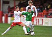 6 April 2010; Jimmy Keohane, Republic of Ireland, in action against Patrick Podrygala, Poland, left. U19 Friendly, Republic of Ireland v Poland, Tolka Park, Dublin. Picture credit: Barry Cregg / SPORTSFILE