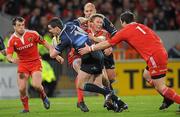 2 April 2010; Jonathan Sexton, Leinster, is tackled by, from left, Ian Dowling, Jean De Villiers and Marcus Horan,  Munster. Celtic League, Munster v Leinster, Thomond Park, Limerick. Picture credit: Diarmuid Greene / SPORTSFILE
