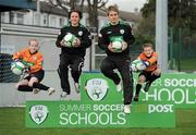 8 April 2010; Republic of Ireland Internationals Kevin Doyle and Aine O'Gorman, with Katie Robinson, age 11, from, Donabate, Dublin, and Bobby O'Meara, age 10, from Limerick, at the launch of the FAI 2010 An Post FAI Summer Soccer Schools Programme. The 5 day camps will see up to 20,000 children from all over Ireland participating at over 270 venues nationwide. The An Post FAI Summer Soccer Schools offer children, from the ages of 6 to 14, a fun and healthy summer activity. The camps provide value for money and are focused on participation rather than competition. Running from July 5 to August 28, each week-long (Monday to Friday, 10.30am to 3.00pm) school is run under the direction of the FAI Technical Director Packie Bonner, and delivered by FAI-qualified coaches, all Garda-vetted in a safe and professional environment. Home Farm FC, Whitehall, Dublin. Picture credit: Brian Lawless / SPORTSFILE