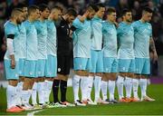 28 March 2016; The Slovenia team stand for a minutes silence. International Friendly, Northern Ireland v Slovenia. National Football Stadium, Windsor Park, Belfast. Picture credit: Oliver McVeigh / SPORTSFILE