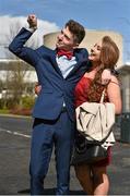 6 April 2016; UCD students Mano Galligan, from Cavan Town, with girlfriend Cassie Gillespie, from Gweedore, Co. Donegal, at the races. Leopardstown, Co. Dublin. Picture credit: Cody Glenn / SPORTSFILE