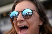 6 April 2016; Maia Penfold, from Surrey, England, watches on during the races. Leopardstown, Co. Dublin. Picture credit: David Fitzgerald / SPORTSFILE
