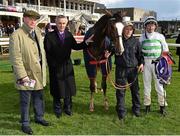 6 April 2016; Jockey Kevin Manning with Altesse, trainer Jim Bolger, second from left, and stud manager Julian Lloyd, after winning the Irish Stallion Farms European Breeders Fund Noblesse Stakes. Leopardstown, Co. Dublin. Picture credit: Cody Glenn / SPORTSFILE