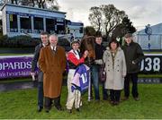 6 April 2016; Jockey Chris Hayes with Beechmount Whisper and the winning connections after winning the 'Colours Bar' Handicap. Leopardstown, Co. Dublin. Picture credit: Cody Glenn / SPORTSFILE