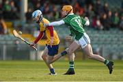 6 April 2016; Conor Tierney, Clare, in action against Darragh Carroll, Limerick. Electric Ireland Munster GAA Hurling Minor Championship, Quarter-Final, Limerick v Clare. Gaelic Grounds, Limerick. Picture credit: Diarmuid Greene / SPORTSFILE