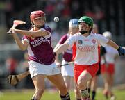 11 April 2010; Denise McGrath, Westmeath, in action against Siobhan Hughes, Tyrone. Camogie National League Division 4 Final, Tyrone v Westmeath, Healy Park, Omagh, Co. Tyrone. Picture credit: Ray McManus / SPORTSFILE