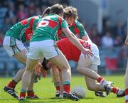 11 April 2010; Jamie O'Sullivan, Cork, in action against Trevor Howley, Ger Cafferkey, left, and Liam O'Malley, right, Mayo. Allianz GAA Football National League Division 1, Round 7, Cork v Mayo, Pairc Ui Chaoimh, Cork. Picture credit: Brian Lawless / SPORTSFILE