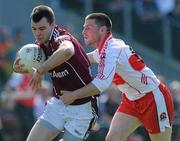 11 April 2010; Conor Healy, Galway, in action against Barry McGuigan, Derry. Allianz GAA Football National League Division 1 Round 7, Galway v Derry, Pearse Stadium, Galway. Picture credit: Ray Ryan / SPORTSFILE