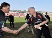 11 April 2010; Cork manager Conor Counihan shakes hands with Mayo manager John O'Mahony after the match. Allianz GAA Football National League Division 1, Round 7, Cork v Mayo, Pairc Ui Chaoimh, Cork. Picture credit: Brian Lawless / SPORTSFILE
