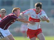 11 April 2010; James Kielt, Derry, in action against Tom Fahy, Galway. Allianz GAA Football National League Division 1 Round 7, Galway v Derry, Pearse Stadium, Galway. Picture credit: Ray Ryan / SPORTSFILE