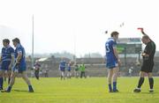 11 April 2010; Referee Maurice Condon issues Rory Woods, Monaghan, 14, with a red card. Allianz GAA Football National League Division 1, Round 7, Kerry v Monaghan, Fitzgerald Stadium, Killarney, Co. Kerry. Picture credit: Stephen McCarthy / SPORTSFILE
