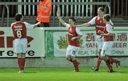 13 April 2010; St Patrick's Athletic's Gareth Coughlan, second from left, celebrates after scoring his side's third goal with team-mates, from left to right, Stuart Byrne, Shane Guthrie and David McAllister. Setanta Sports Cup Semi-Final, 1st Leg, St Patrick's Athletic v Sligo Rovers, Richmond Park, Inchicore, Dublin. Picture credit: David Maher / SPORTSFILE