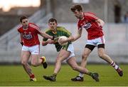 7 April 2016; Jack Savage, Kerry, in action against Michael McSweeney, left, and Ryan Harkin, Cork. EirGrid Munster GAA Football U21 Championship Final, Kerry v Cork. Austin Stack Park, Tralee, Co Kerry. Picture credit: Diarmuid Greene / SPORTSFILE