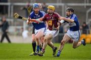 9 April 2016; Shane Power, Westmeath, in action against Neil Foyle, left, and PJ Scully, Laois. Allianz Hurling League, Division 1B Promotion / Relegation Play-off, Westmeath v Laois, O'Connor Park, Tullamore, Co. Offaly. Picture credit: Brendan Moran / SPORTSFILE