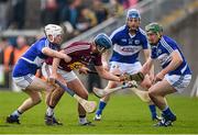 9 April 2016; Tommy Gallagher, Westmeath, in action against Laois players, from left, Colm Stapleton, Neil Foyle and Willie Dunphy. Allianz Hurling League, Division 1B Promotion / Relegation Play-off, Westmeath v Laois, O'Connor Park, Tullamore, Co. Offaly. Picture credit: Brendan Moran / SPORTSFILE