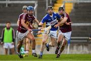 9 April 2016; PJ Scully, Laois, in action against Aonghus Clarke, left, and Tommy Gallagher, Westmeath. Allianz Hurling League, Division 1B Promotion / Relegation Play-off, Westmeath v Laois, O'Connor Park, Tullamore, Co. Offaly. Picture credit: Brendan Moran / SPORTSFILE