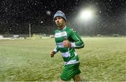 9 April 2016; Stephen McGann, Pike Rovers, wearing a wooly hat, leaves the pitch after the match was abandoned. FAI Junior Cup Semi-Final in association with Aviva and Umbro, St. Peters FC v Pike Rovers, Leah Victoria Park, Tullamore, Co. Offaly. Picture credit: Brendan Moran / SPORTSFILE
