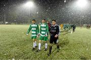 9 April 2016; Pike Rovers players Jason Mullins, left, and Cian Collins, with Michael Lee, right, St Peter's, leave the pitch after the match was abandoned. FAI Junior Cup Semi-Final in association with Aviva and Umbro, St. Peters FC v Pike Rovers, Leah Victoria Park, Tullamore, Co. Offaly. Picture credit: Brendan Moran / SPORTSFILE