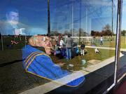 10 April 2010; Hurling fans stay out of the sun to enjoy their cup of tea in the clubhouse, while keeping an eye on the action. Allianz GAA Hurling National League Division 3A Final, Kerry v Derry, Padraig Pearses, Woodmount, Roscommon. Picture credit: Brian Lawless / SPORTSFILE