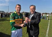 10 April 2010; Paddy Naughton, President of Connacht Council, presents Kerry captain Colin Harris with the cup. Allianz GAA Hurling National League Division 3A Final, Kerry v Derry, Padraig Pearses, Woodmount, Roscommon. Picture credit: Brian Lawless / SPORTSFILE