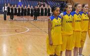 25 March 2010; The St. Attractas Community Schooland Christ King Secondary School players, right, stand for the National Anthem. U16C Girls - All-Ireland Schools League Finals 2010, Christ King Secondary School, Cork v St. Attractas Community School, Tubbercurry, Co. Sligo, National Basketball Arena, Tallaght, Dublin. Picture credit: Brian Lawless / SPORTSFILE