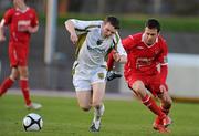 16 April 2010; Conan Byrne, Sporting Fingal, in action against Shaun Kelly, Dundalk. Airtricity League Premier Division, Sporting Fingal v Dundalk Morton Stadium, Santry, Dublin. Picture credit: Brian Lawless / SPORTSFILE