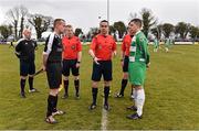 9 April 2016; Referee Conor Byrne performs the coin toss between team captains Niall Scullion, left, St Peter's FC and Patrick Mullins, Pike Rovers. FAI Junior Cup Semi-Final in association with Aviva and Umbro, St. Peters FC v Pike Rovers, Leah Victoria Park, Tullamore, Co. Offaly. Picture credit: Brendan Moran / SPORTSFILE