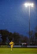 9 April 2016; St. Peter's FC goalkeeper Keith Hynes tries to keep warm during a snow shower during the game. FAI Junior Cup Semi-Final in association with Aviva and Umbro, St. Peters FC v Pike Rovers, Leah Victoria Park, Tullamore, Co. Offaly. Picture credit: Brendan Moran / SPORTSFILE