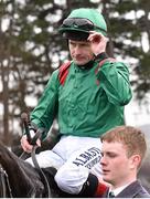 10 April 2016; Jockey Pat Smullen enters the parade ring on Harzand after winning the P.W. McGrath Memorial Ballysax Stakes. Leopardstown, Co. Dublin. Picture credit: Cody Glenn / SPORTSFILE