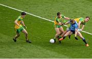 10 April 2016; Paul Mannion, Dublin, in action against Donegal players, left to right, Stephen McBrearty, Paddy McGrath, and Eamon McGee. Allianz Football League, Division 1, Semi-Final, Dublin v Donegal, Croke Park, Dublin. Picture credit: Dáire Brennan / SPORTSFILE